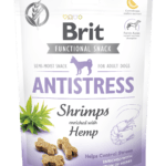 Opakowanie 150g funkcjonalnych przysmaków Brit Care Functional Snack Antistress Shrimp z grafiką krewetek i liści konopi, dedykowane dla psów w sytuacjach stresowych.